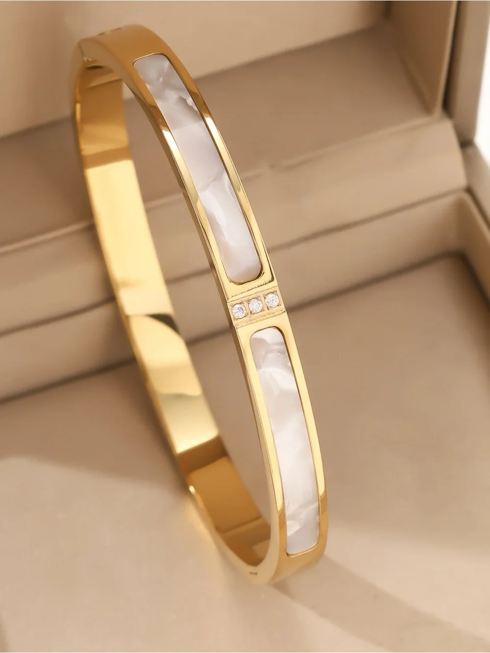 Stainless Steel Gold Bangle Bracelet with White Inlay and Crystal Accents